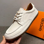 Men's genuine leather white sports shoes, casual shoes with comfortable and breathable design.