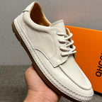 Men's genuine leather white sports shoes, casual shoes with comfortable and breathable design.