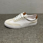 New white leather sports shoes, stylish and casual. Men's low-top breathable shoes.