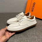 Men's genuine leather white sports shoes, casual shoes with comfortable and breathable design.