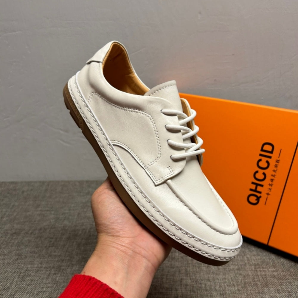 Men's genuine leather white sports shoes, casual shoes with comfortable and breathable design.