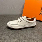 Men's genuine leather white sports shoes, casual shoes with comfortable and breathable design.