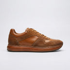 QHCCID | Patched and aged shoes