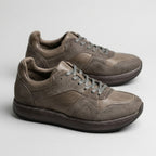 QHCCID | Patched and aged shoes