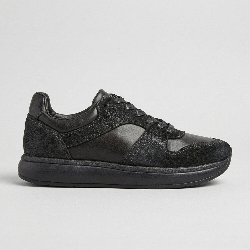 QHCCID | Patched and aged shoes