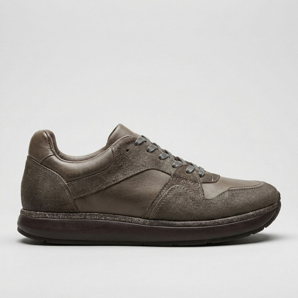 QHCCID | Patched and aged shoes