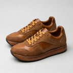 QHCCID | Patched and aged shoes