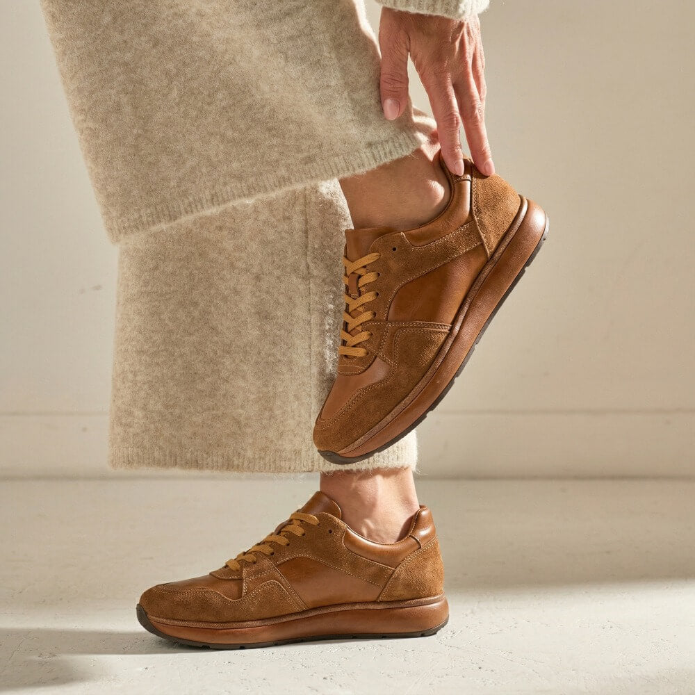 QHCCID | Patched and aged shoes