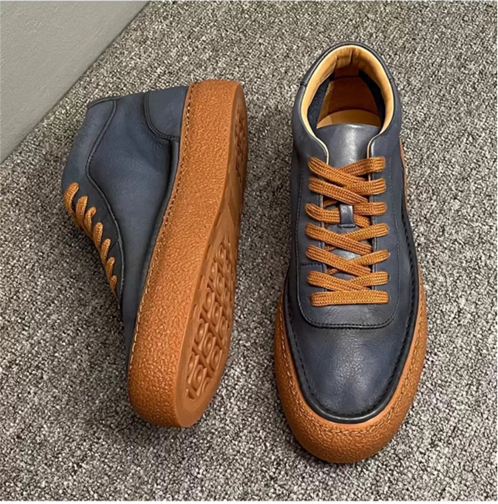 High-top green men's leather boots, designed to be comfortable and soft, are a casual style of boots.