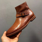 Handmade leather casual lace-up ankle boots for men. Genuine leather sole. Adjustable straps.