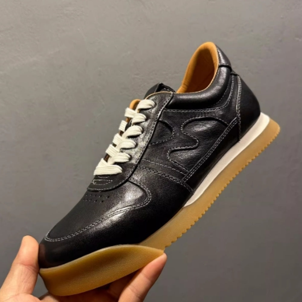 Comfortable and soft interior men's training shoes. Leather sole sports casual shoes.