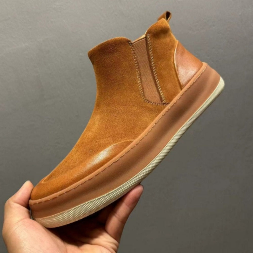This Chelsea boot has a retro style and is both fashionable and beautiful. It is a warm, high-top boot.