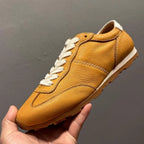 The new leather perforated men's retro training shoes are suitable for light and active wearing needs.