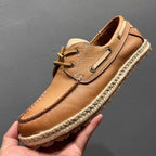 A retro-style handmade casual breathable soft leather canvas shoe. Retro and fashionable fishing shoes.