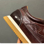 Comfortable and soft interior men's training shoes. Leather sole sports casual shoes.