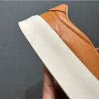 New men's high-quality leather casual loafers. Made of genuine leather. Shoes with a thick sole design.