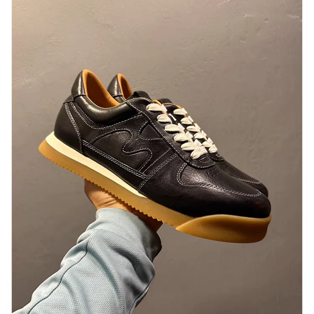 Comfortable and soft interior men's training shoes. Leather sole sports casual shoes.