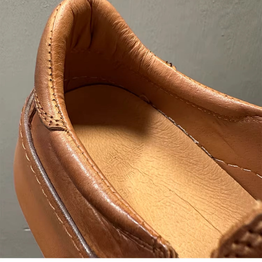 A retro-style round toe fashion casual leather shoe, equipped with a soft inner lining and a thick sole.