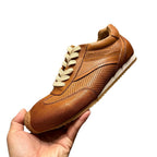 Men's leather sports shoes, featuring a breathable mesh design, with a classic yet fashionable style