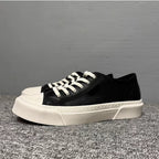 This new model of casual sports shoes features a thick leather sole and a genuine leather upper.