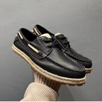 A retro-style handmade casual breathable soft leather canvas shoe. Retro and fashionable fishing shoes.