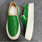 New men's high-quality leather casual loafers. Made of genuine leather. Shoes with a thick sole design.