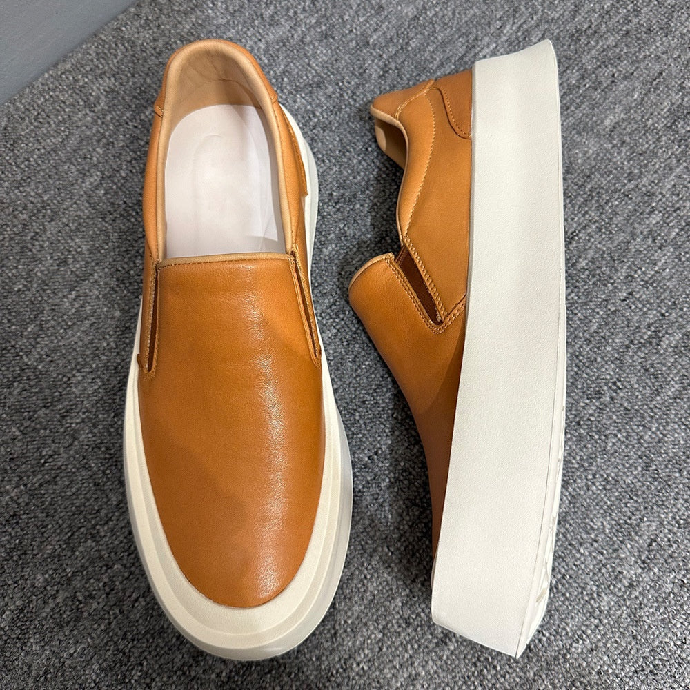 New men's high-quality leather casual loafers. Made of genuine leather. Shoes with a thick sole design.