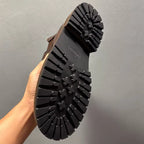 Men's leather Chelsea boots, with thick soles and a fully enclosed upper, a casual high-top style