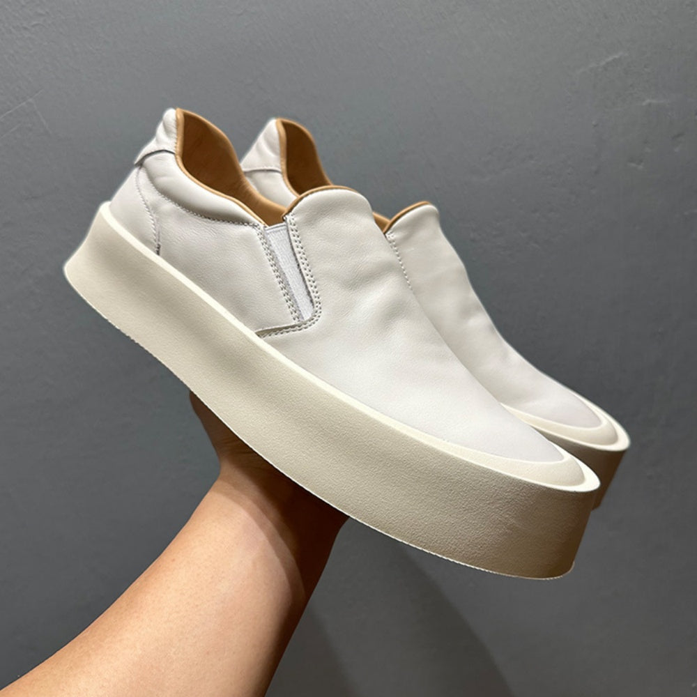 New men's high-quality leather casual loafers. Made of genuine leather. Shoes with a thick sole design.