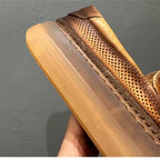 Leather hollowed-out breathable sneakers, casual shoes made of lightweight and soft cowhide.