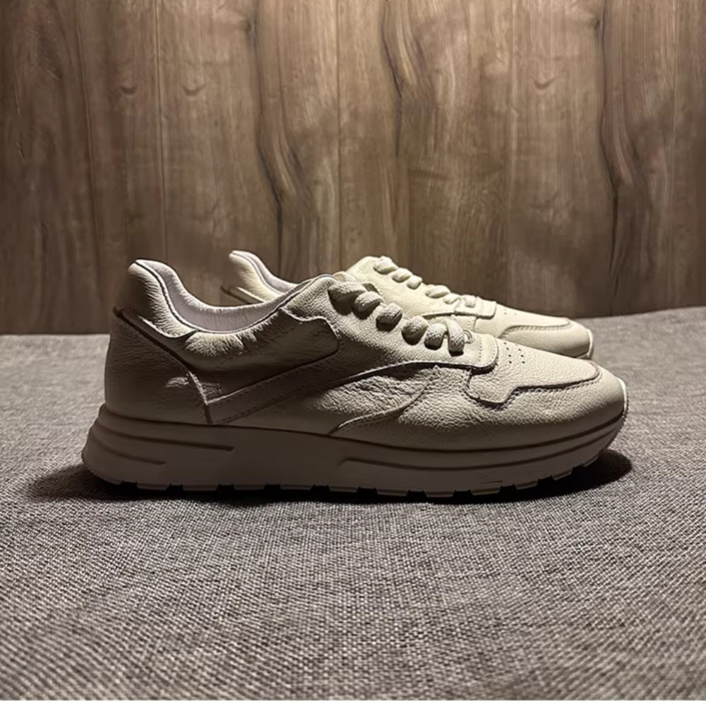 New vintage leather shoes with a thick sole and an elastic surface, they are fashionable sports shoes.