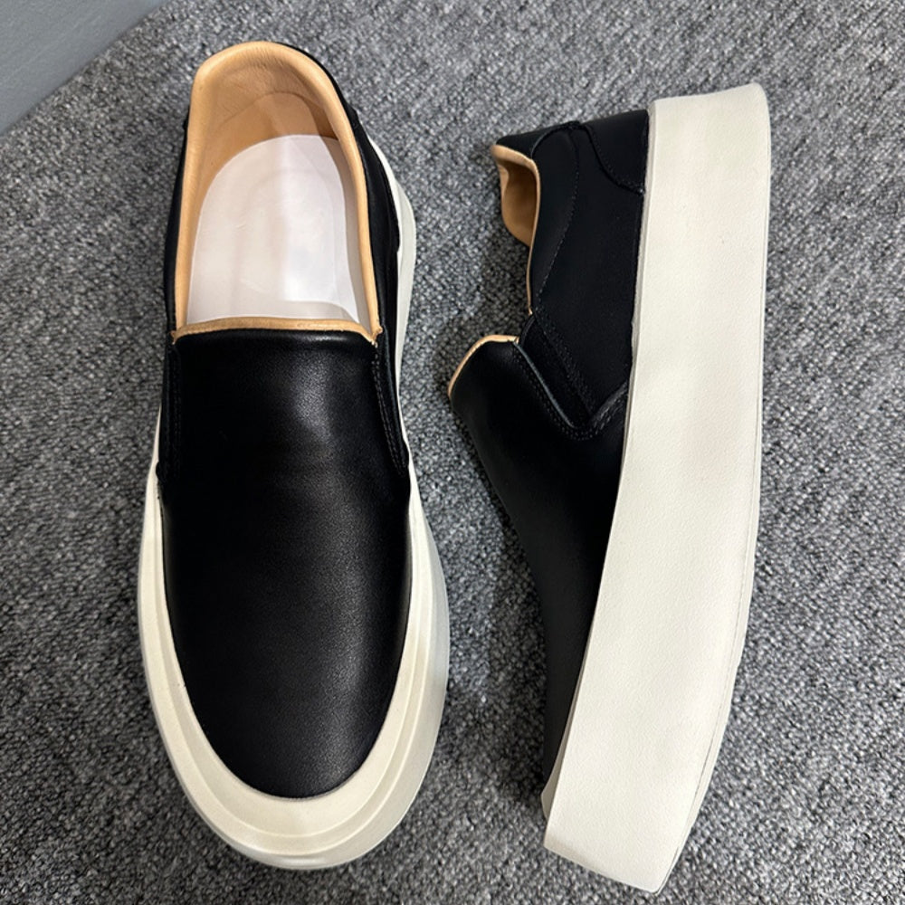 New men's high-quality leather casual loafers. Made of genuine leather. Shoes with a thick sole design.