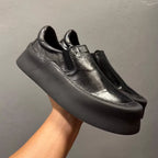 A retro-style round toe fashion casual leather shoe, equipped with a soft inner lining and a thick sole.