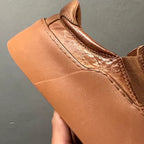 A retro-style round toe fashion casual leather shoe, equipped with a soft inner lining and a thick sole.