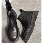 Men's leather Chelsea boots, with thick soles and a fully enclosed upper, a casual high-top style