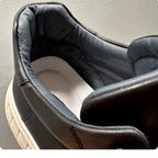 A brand-new, durable and casual leather high-top sports shoes, made of canvas material with a thick sole.