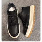 A brand-new, durable and casual leather high-top sports shoes, made of canvas material with a thick sole.