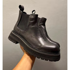 Men's leather Chelsea boots, with thick soles and a fully enclosed upper, a casual high-top style
