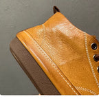 Men's high-top leather shoes are made of soft leather and are suitable for both work and casual wear.