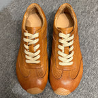 Men's leather sports shoes, featuring a breathable mesh design, with a classic yet fashionable style