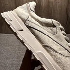 New vintage leather shoes with a thick sole and an elastic surface, they are fashionable sports shoes.