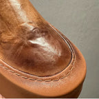A retro-style round toe fashion casual leather shoe, equipped with a soft inner lining and a thick sole.