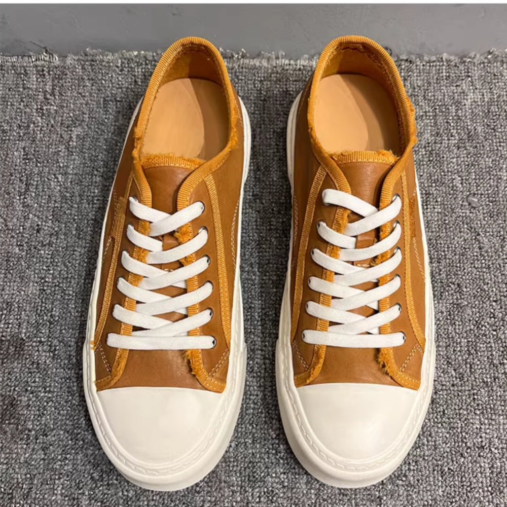 This new model of casual sports shoes features a thick leather sole and a genuine leather upper.