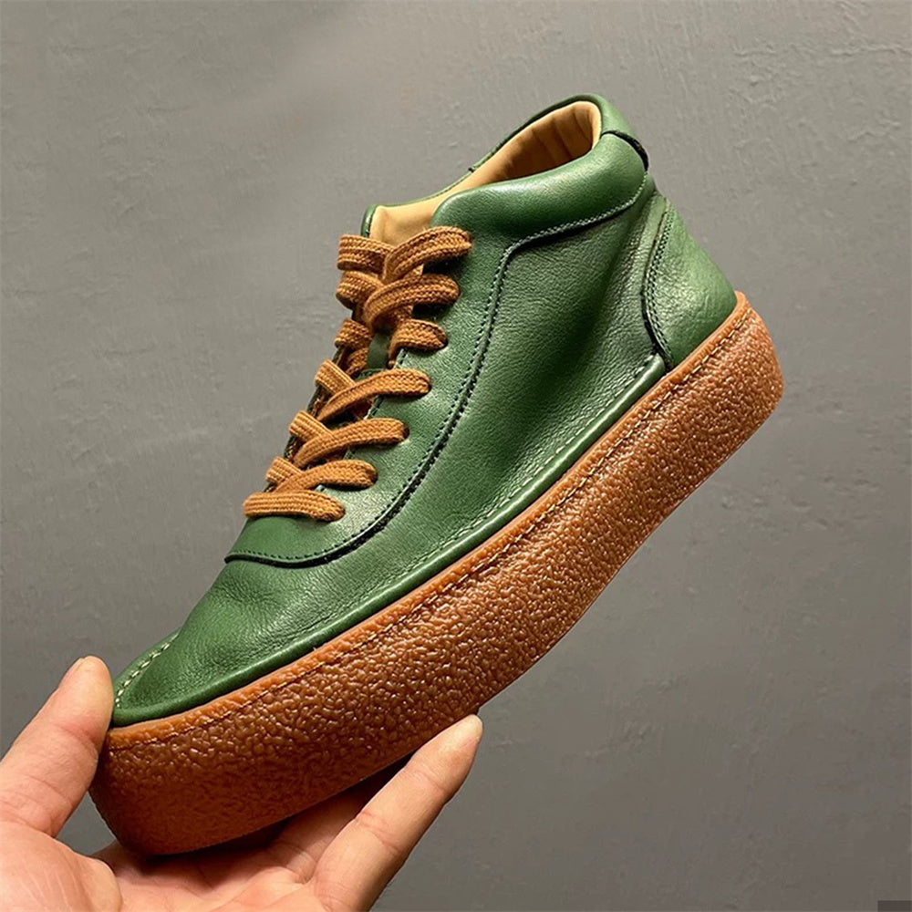 High-top green men's leather boots, designed to be comfortable and soft, are a casual style of boots.