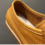 Men's leather perforated breathable shoes, with a retro and casual style, flat sole, men's style shoes