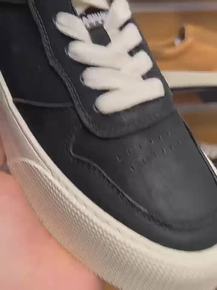 Men's leather stylish new trendy multi-functional breathable casual sports shoes. Trendy shoe style.